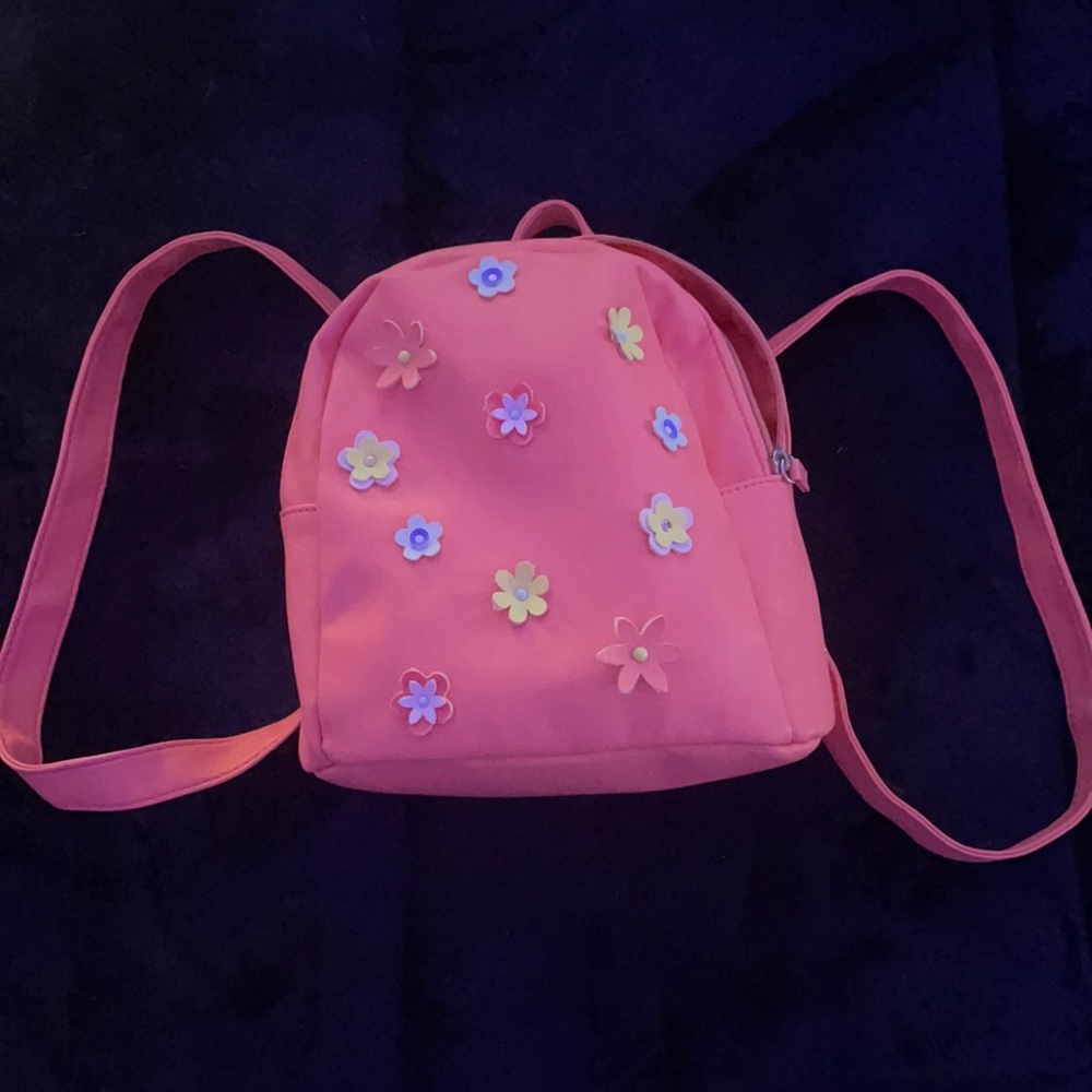 Small pink backpack with flowers